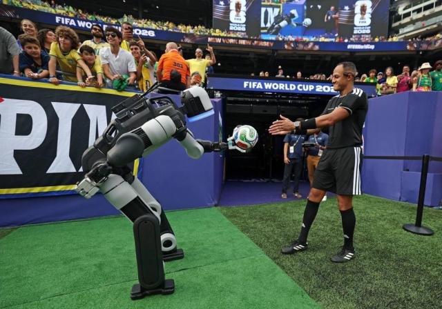 Moment of handing the ball to the referee