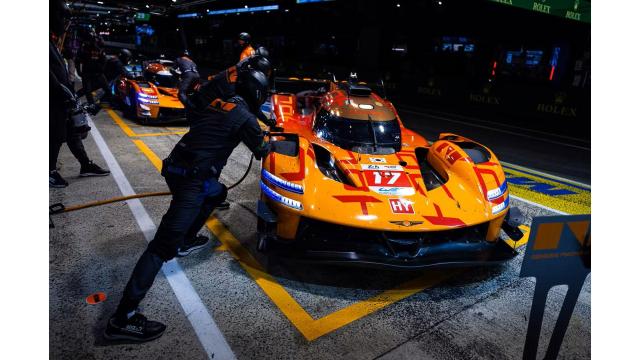 A Genesis Magma Racing crew member pushes the No 17 GMR-001 hypercar during a pit stop at the 24 Hours of Le Mans Courtesy of Hyundai Motor Group