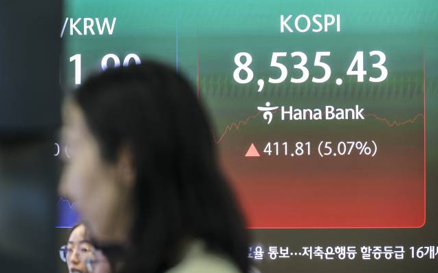 An electronic display board at the dealing room of Hana Bank headquarters in central Seoul displayed the benchmark KOSPI index on June 15 2026 AJP Yoo Na-hyun