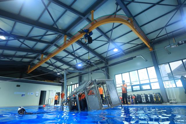 Firefighters from the Gyeonggido Special Rescue Service conduct emergency water survival training at the Gyeonggi Fire Academy rescue training facility in Yongin Gyeonggi Province on July 8 2026 AJP Han Jun-gu