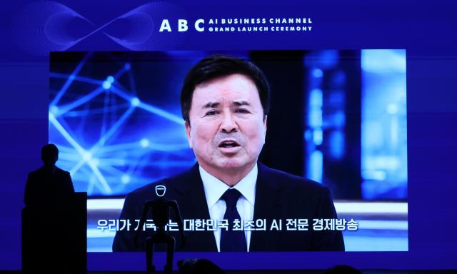 An AI-generated video featuring the opening address by Kwak Young-gil chairman of Aju News Group is shown during the 2026 ABC Grand Launch Ceremony at The Plaza Seoul in central Seoul on July 8 2026 AJP Yoo Na-hyun