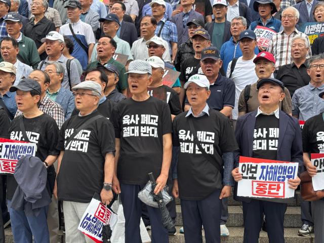 Participants chant slogans during a rally against the proposed merger of South Korea’s military academies and the relocation of the Korea Military Academy in front of the National Assembly in Seoul on July 8 2026 AJP Kim Hee-su