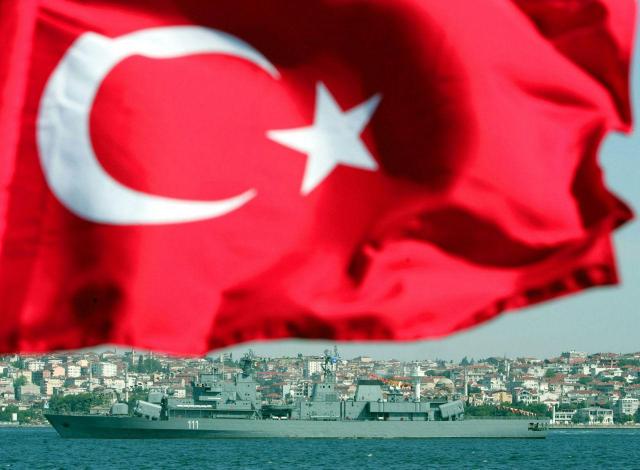 A Turkish flag flies on a ship in front of Romanian Navy frigate ‘Mărășești’ in Istanbul Courtesy of NATO 