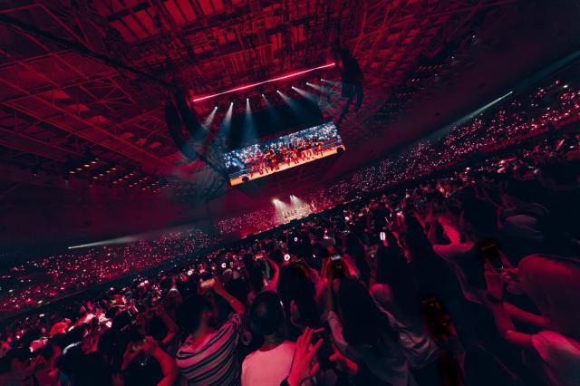 Fans wave lightsticks during TWICEs finale concert of the THIS IS FOR world tour at KSPO Dome in Seoul  Courtesy of JYP Entertainment