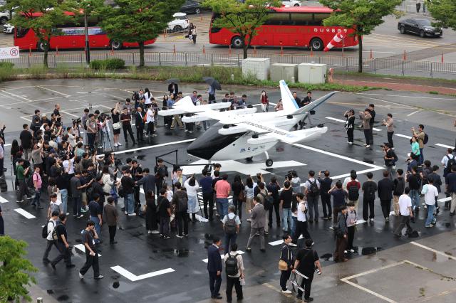 A UAM aircraft is unveiled during the 2026 Korea Drone  UAM Expo and Urban Air Mobility UAM Flight Showcase at the INU Innovation Center of the University of Incheon in Incheon on July 15 2026 AJP Yoo Na-hyun