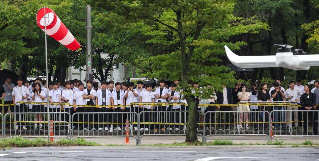 Students and visitors watch Sambo Motors Group’s B-32-R2 UAM aircraft during the K-UAM Flight Showcase at Incheon National University’s INU Innovation Center on July 15 2026 AJP Yoo Na-hyun