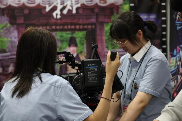 Visitors experience interactive booths during the 2026 Seoul Career and Vocational Expo at the aT Center in Yangjae Seoul on July 16 2026 AJP Yoo Na-hyun