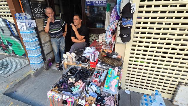 A cat rests atop displayed merchandise at a store in Istanbul on July 18 Photo provided by DDANZI Editor Kim Chang-kyu
