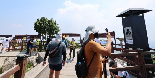 "K-登山"风靡全球 外籍游客旅游路线悄然变化