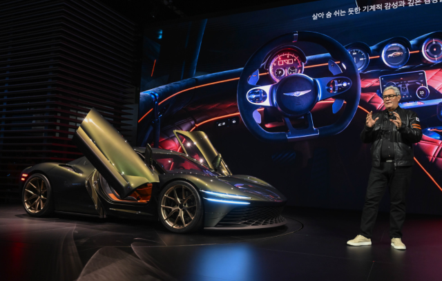 Luc Donckerwolke Chief Creative Officer of Hyundai Motor Group introduces the Magma GT Concept on the main stage Courtesy of Hyundai Motor
