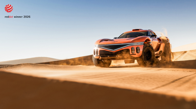 This photo provided by the Hyundai Motor Group show the poster of Red Dot Award and an unreleased Genesis model running through a desert 