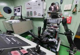 Navy tests humanoid robot at ships wheel in first crew experiment