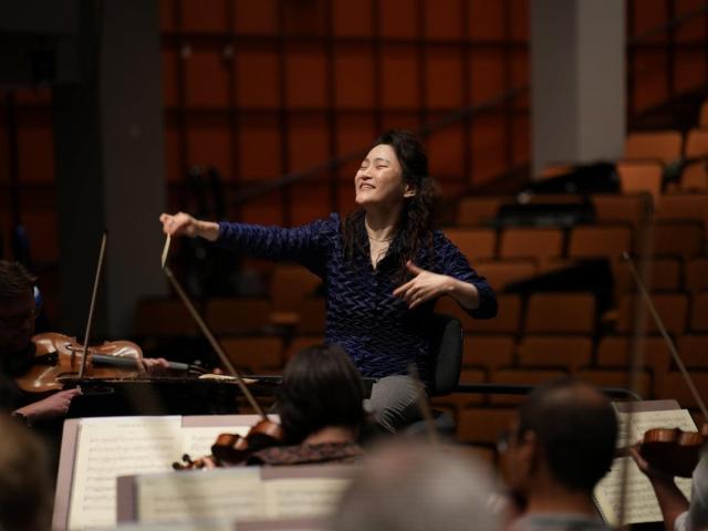 Han-Na Chang president of the Seoul Arts Center and an internationally acclaimed cellist conducts an orchestra during a rehearsal Photo courtesy of Han-Na Changs official website
