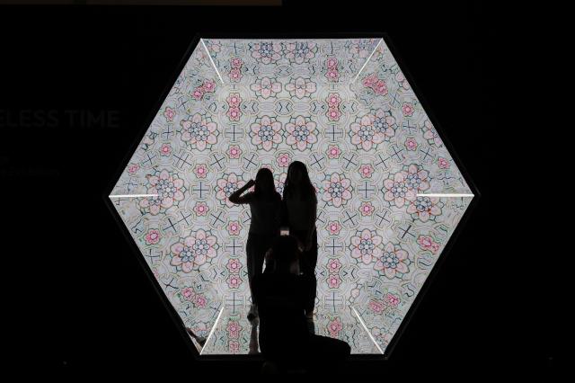 Visitors pose for commemorative photos at the Korea Pavilion the official host country exhibition held alongside the 48th session of the UNESCO World Heritage Committee at BEXCO in Busan on July 24 2026 AJP Yoo Na-hyun