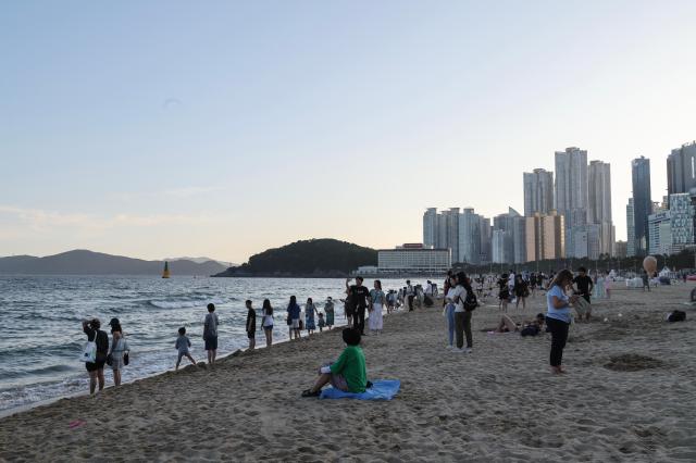 Citizens and tourists alike head to waterfront to cool off Haeundae Busan July 24 2026 AJP Yoo Na-hyun
