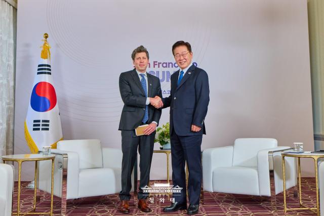 South Korean President Lee Jae Myung right shakes hands with OpenAI CEO Sam Altman during their meeting at the Fairmont San Francisco hotel in San Francisco on July 24 2026 Courtesy of Cheong Wa Dae