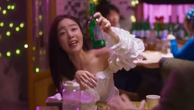 This photo captured from a popular Korean drama series Work Later Drink Now from OTT TVing show protagonist drinking Korean Soju 