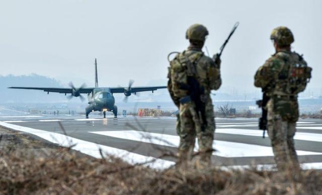 A South Korean Air Force CN-235 transport aircraft lands on an emergency runway in Changnyeong South Gyeongsang Province during a joint South Korea-US Air Force drill on March 7 2023 Courtesy of the ROK Air Force