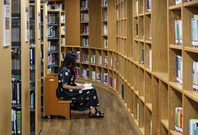 People read books to escape the heat at Seoul Metropolitan Library in Jung District central Seoul as the daytime high reached 32 degrees Celsius on July 28 2026 AJP Yoo Na-hyun