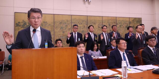Former Korea Football Association president Chung Mong-gyu left takes the witness oath during a hearing on Korea Football Association affairs held by the National Assemblys Culture Sports and Tourism Committee in Yeouido Seoul on July 30 2026 Joint Press Corps