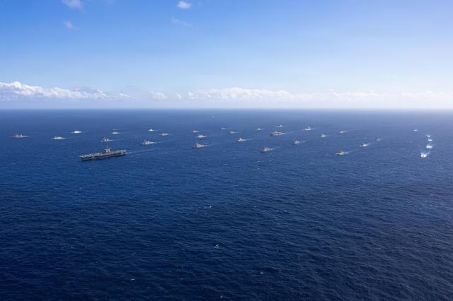 Combined naval forces participating in the 2026 Rim of the Pacific Exercise RIMPAC conduct maritime training north of the Hawaiian Islands on July 22 2026 Courtesy of the US Navy