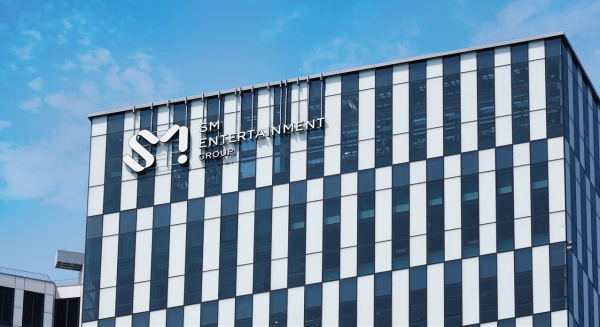 This photo provided by SM Entertainment show the logo of SM Entertainment on a building. 