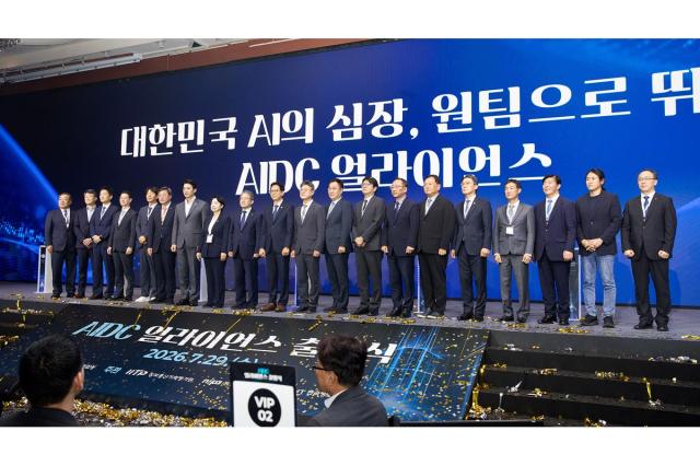 South Koreas Deputy Prime Minister and Science and ICT Minister Bae Kyung-hoon poses for a commemorative photo during the launch ceremony of the AI Data Center Alliance at the Lotte Hotel in Seoul on July 29 Ministry of Science and ICT