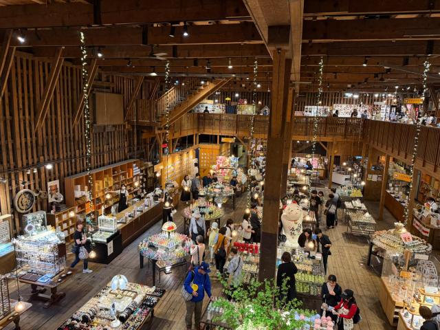 Shoppers browse souvenirs inside a music box and gift shop in Otaru Japan Tourist spending on shopping has become a growing draw for visitors to Japan AJP Joonha Yoo