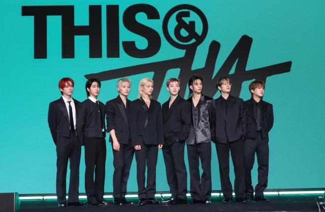Members of Stray Kids pose in front of a backdrop for the groups new EP THIS  THAT during a press event in Seoul on Aug 6 2026 AJP Yoo Na-hyun