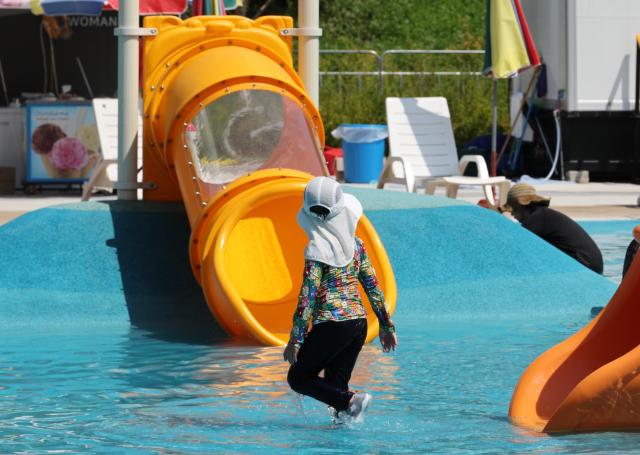 People cool off at the water playground in Gwangnaru Hangang Park in eastern Seoul on Aug 5 2026 Aju Business Daily Yoo Na-hyun