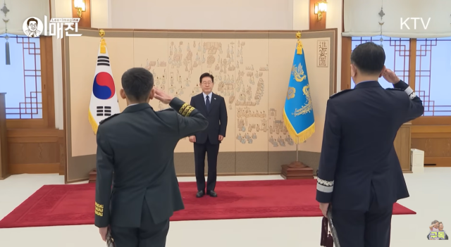 President Lee Jae Myung receives salutes from generals during a ceremony marking their promotions and the presentation of tassels for the Samjeong Sword at Cheong Wa Dae in Seoul on Aug 7 2026 Screenshot captured from KTVs YouTube channel