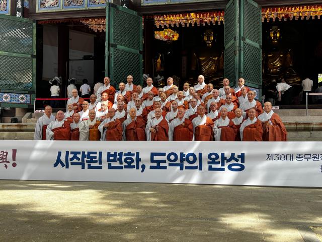 Monks pose for a group photo at Jogyesa Temple in central Seoul on Aug 11 2026 after declaring their support for Ven Jinwoos re-election as chief administrator of the Jogye Order AJP Joonha Yoo