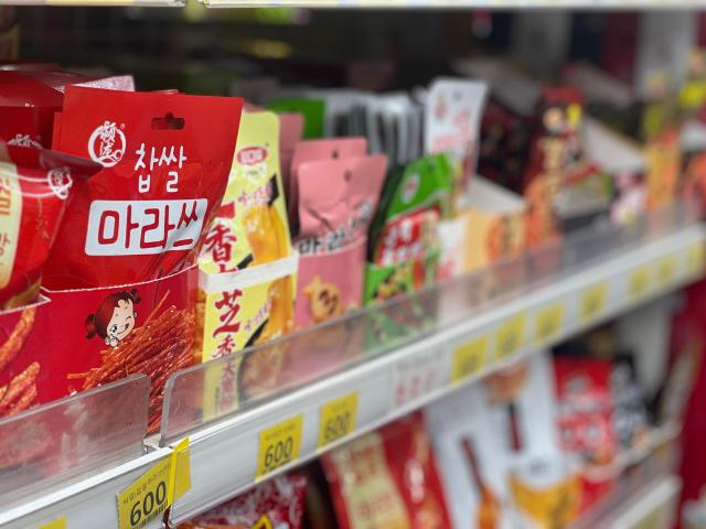 Chinese snacks spread across Korean shelves, drawing curiosity and scrutiny.