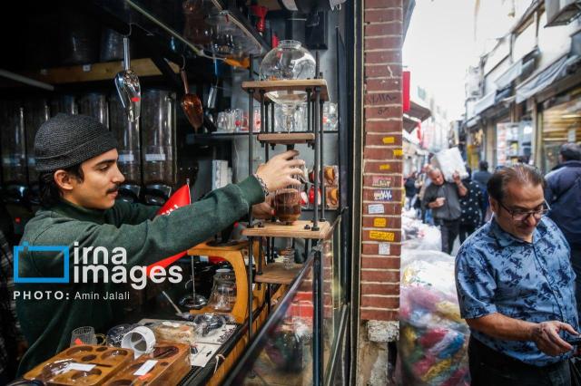 A shop owner prepares coffee in a busy alley in Iran Courtesy of the Embassy of the Islamic Republic of Iran in Seoul