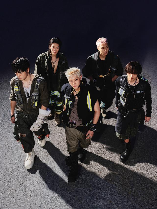 Members of K-pop boy group NCT 127 is posing for their group photo before releasing their seventh studio album Blingy on Aug 24 Courtesy of SM Entertainment 