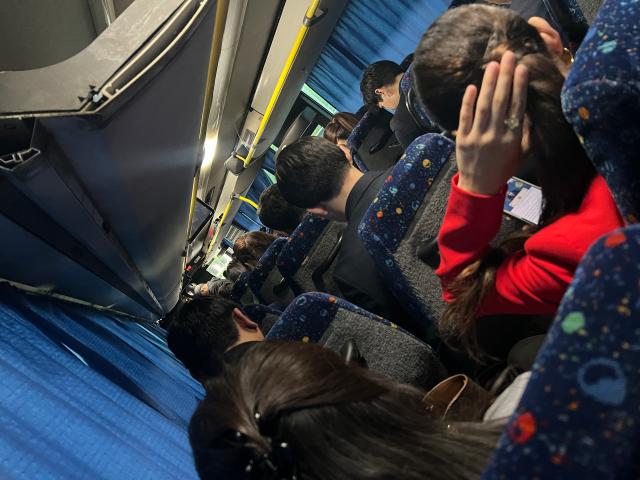 Photo from the inside of the bus taken as journalist are sitting packed near one another heading toward the Palace of Independence for the voting event on Aug 23 in Astana Kazakhstan AJP Joonha Yoo
