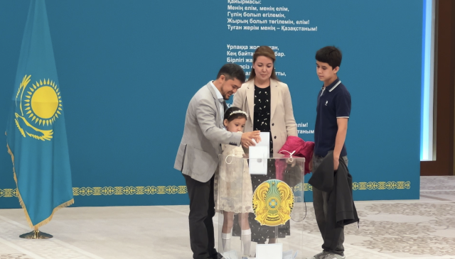 Family members are casting vote at the Palace of Independence for the voting event on Aug 23 in Astana Kazakhstan AJP Joonha Yoo