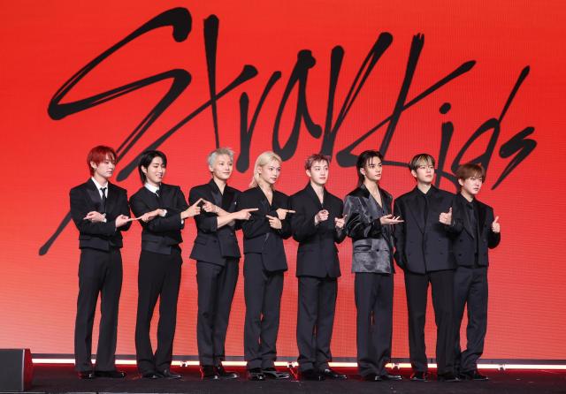 Members of K-pop boy group STRAY KIDS are posing for a group photo during the press conference of their latest mini album This  That Courtesy of JYP Entertainment 