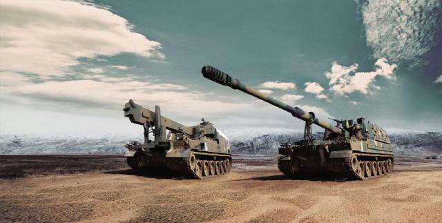 Hanwha Aerospace’s K9 self-propelled howitzer right and K10 ammunition resupply vehicle left Courtesy of Hanwha Aerospace

