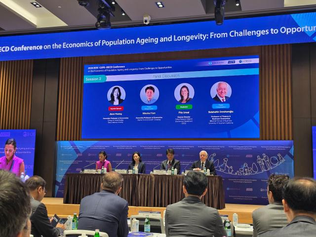 From left Filiz Unsal of the OECD Hwang Jisoo of Seoul National University Yum Minchul of Virginia Commonwealth University and Selahattin Imrohoroglu of the University of Southern California take questions during a panel discussion at the 2026 BOK-CEPR-OECD Conference in Seoul on Sept 2 2026 AJP Kim Yeon-jae