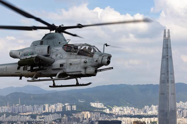 A US Marine Corps AH-1Z Viper flies over Seoul during the Korea Marine Exercise Program 262 on July 24 2026 US Marine Corps photo by Lance Cpl Carlos Paz-Sosa