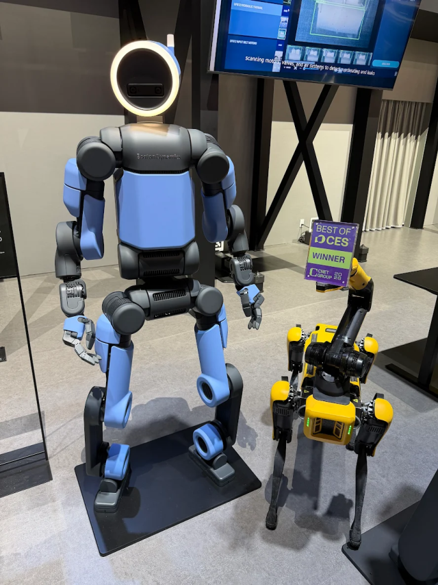 Boston Dynamics humanoid robot model Atlas and quadruped robot Spot on display at the CES 2026 Courtesy of Hyundai Motor Group