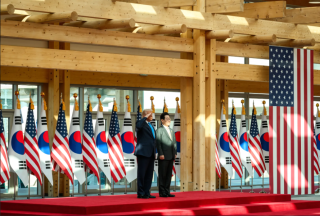 US President Donald Trump left salutes beside South Korean President Lee Jae Myung during an arrival ceremony at the Gyeongju National Museum in Gyeongju South Korea on Oct 29 2025 Official White House Photo by Daniel Torok