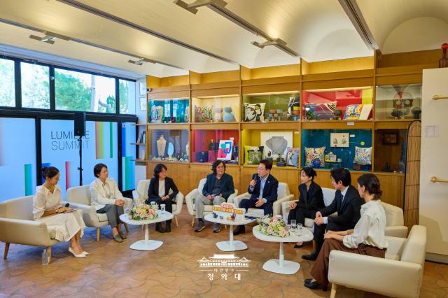 President Lee Jae Myung center meets with filmmaker Lee Chang-dong 4th from left and actress Jeon Do-yeon 6th from left during an event held as part of the Lumiere Summit in Saint-Paul-de-Vence France on Sept 7 2026 Courtesy of Cheong Wa Dae