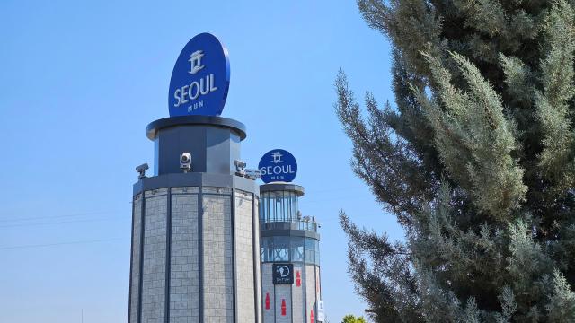 A tower bearing the Seoul Mun logo stands at the Seoul Mun shopping and leisure complex along the Burjar Canal in Tashkent Uzbekistan AJP Lee Jung-woo