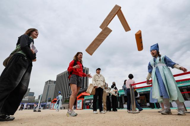 Visitors attend the 2026 Spring Royal Culture Festival at Gyeongbokgung Palace in Seoul on April 27 2026 AJP Yoo Na-hyun
