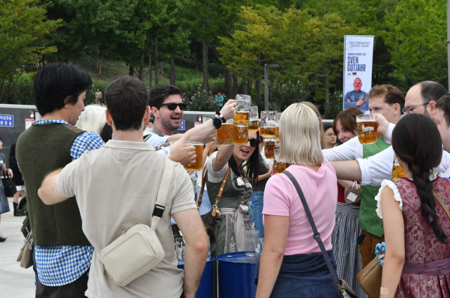 Prost! Oktoberfest fills Seoul with beer, brass bands and crowds