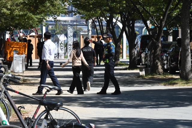 Police officers patrol Yeouido Hangang Park during the Korea-Kazakhstan Cultural Heritage Exchange a side event of the 2026 Korea-Central Asia Summit in Seoul on Sept 16 2026 AJP Joonha Yoo