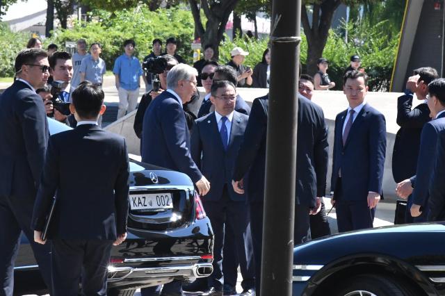 Officials and security personnel gather as a President of Kazakh and following delegation arrives at the Korea-Kazakhstan Cultural Heritage Exchange at Yeouido Hangang Park in Seoul on Sept 16 2026 AJP Joonha Yoo