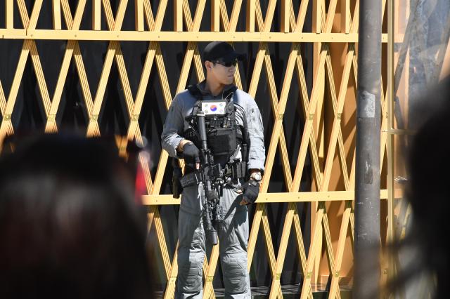 A security officer stands guard during the Korea-Kazakhstan Cultural Heritage Exchange at Yeouido Hangang Park in Seoul on Sept 16 2026 AJP Joonha Yoo